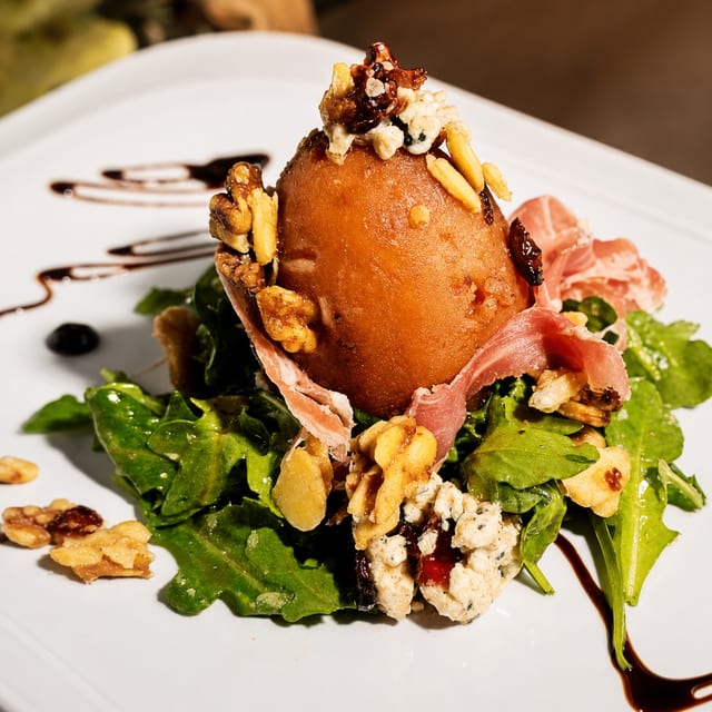 Organic Wine Poach Pear with Prosciutto & Goat Cheese.
